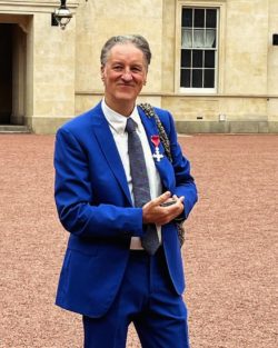 Phil with his MBE medal