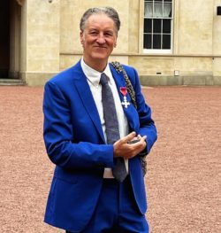 Phil with his MBE medal